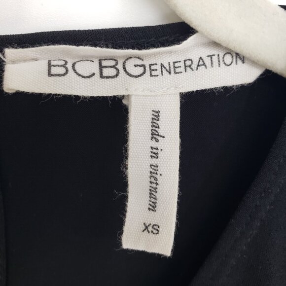 3/$25 BCBGeneration Faux Wrap Romper XS Long Sleeves Surplice V Neck BCBG Black - Picture 3 of 9